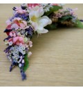 Tocado de novia con flor de almendro de tela, limonium y lavanda preservada