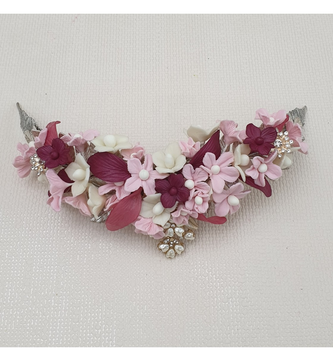 Tocado de novia flores de porcelana fría en tonos rosados